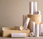 Collection of VELY lip balm products on a neutral background