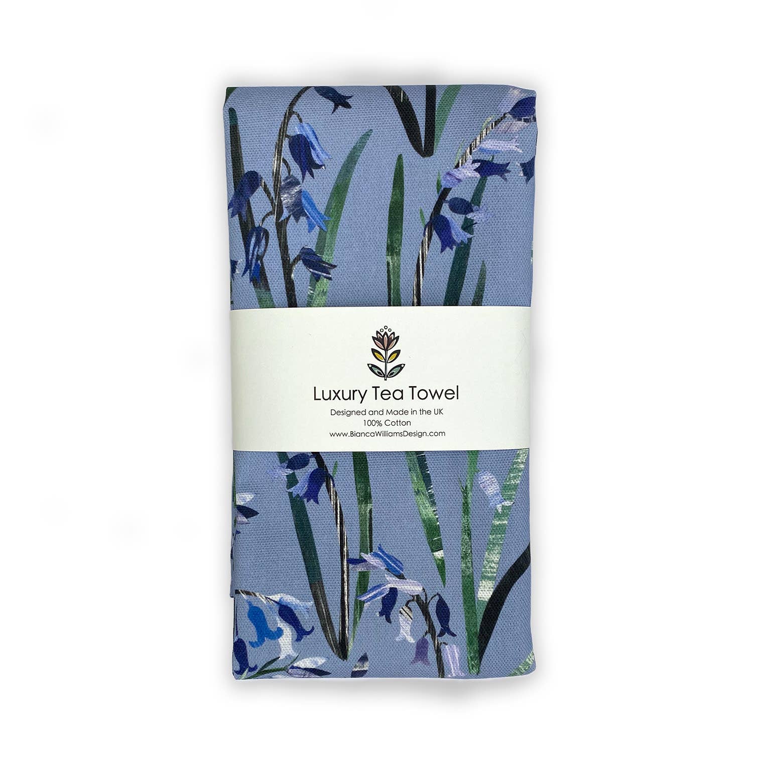 Folded handmade cotton tea towel with floral bluebell design on a white background