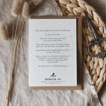 Card with text on a textured surface with decorative elements