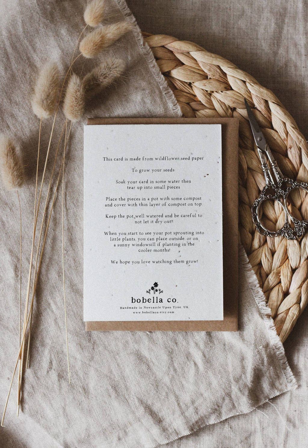 Card with text on a textured surface with decorative elements