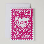 Pink laser-cut card with 'Mum' text on a white background