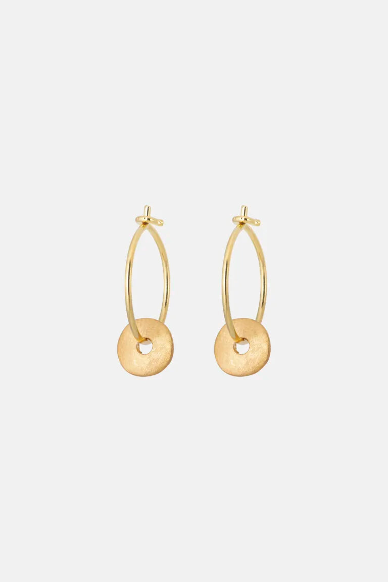 Gold hoop earrings on a white background