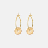 Gold hoop earrings on a white background