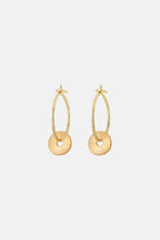 Gold hoop earrings on a white background