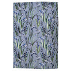 Handmade cotton teatowel with floral bluebell pattern on a blue background