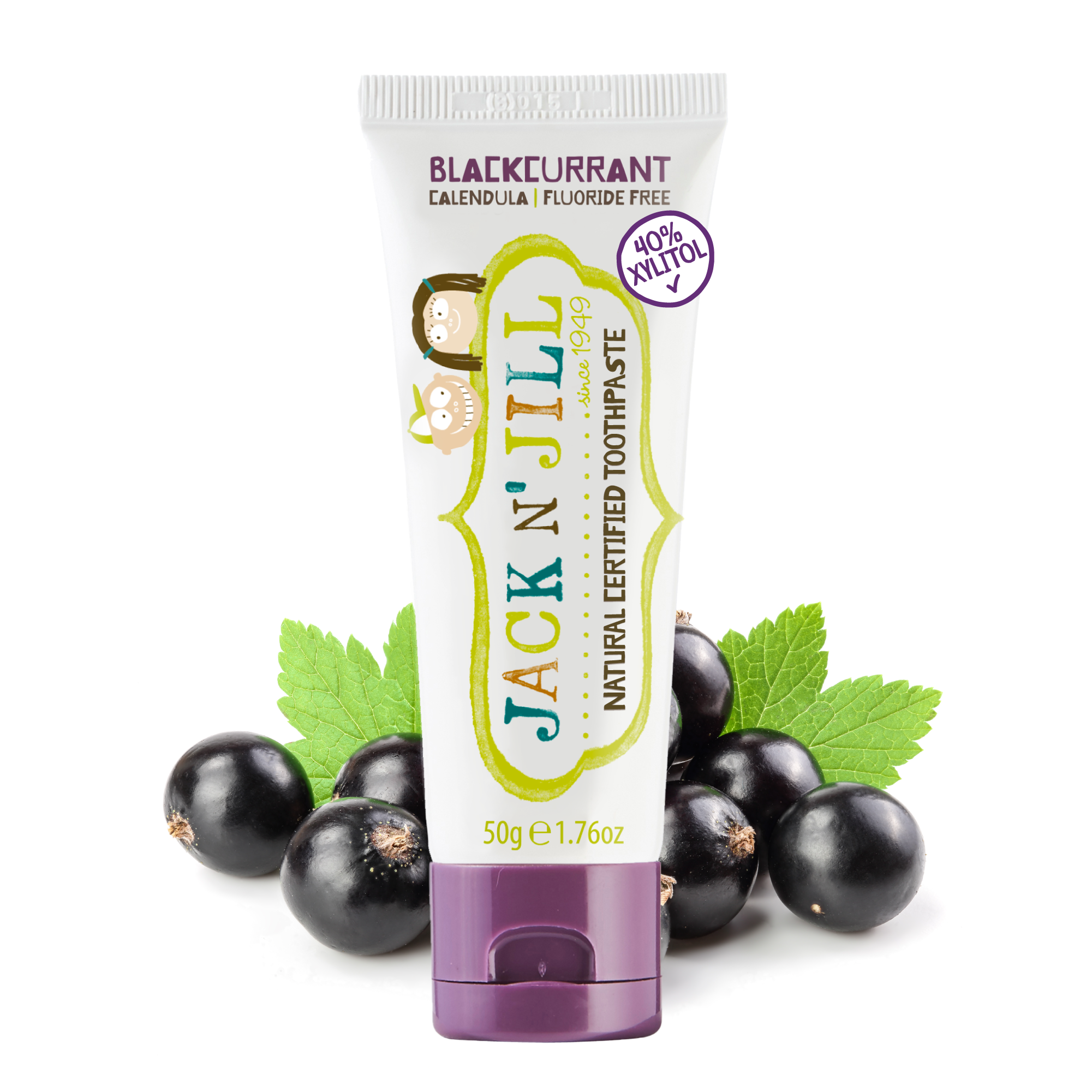Jack N' Jill toothpaste tube with blackcurrants and mint leaves on a white background
