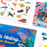 Colorful 'Who's Hiding in the Ocean?' children's game and cards with ocean-themed illustrations on a white background