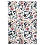 Floral and leaf patterned organic cotton teatowel on a white background