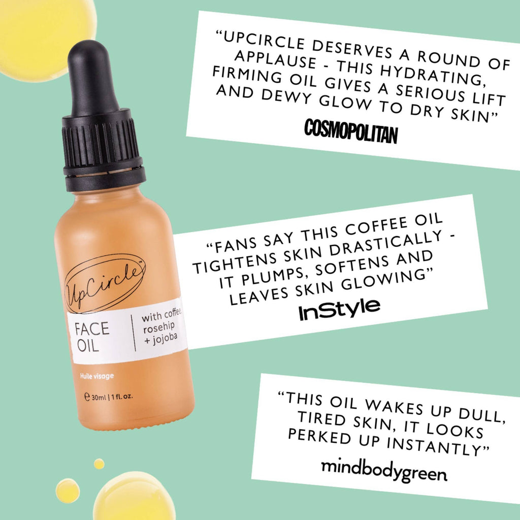 UpCircle Face Oil bottle with positive reviews from Cosmopolitan magazine, InStyle magazine and MindBodyGreen, on a light green background