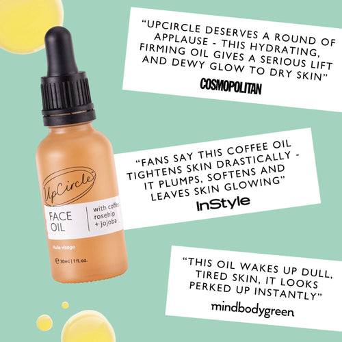 UpCircle Face Oil bottle with positive reviews from Cosmopolitan magazine, InStyle magazine and MindBodyGreen, on a light green background