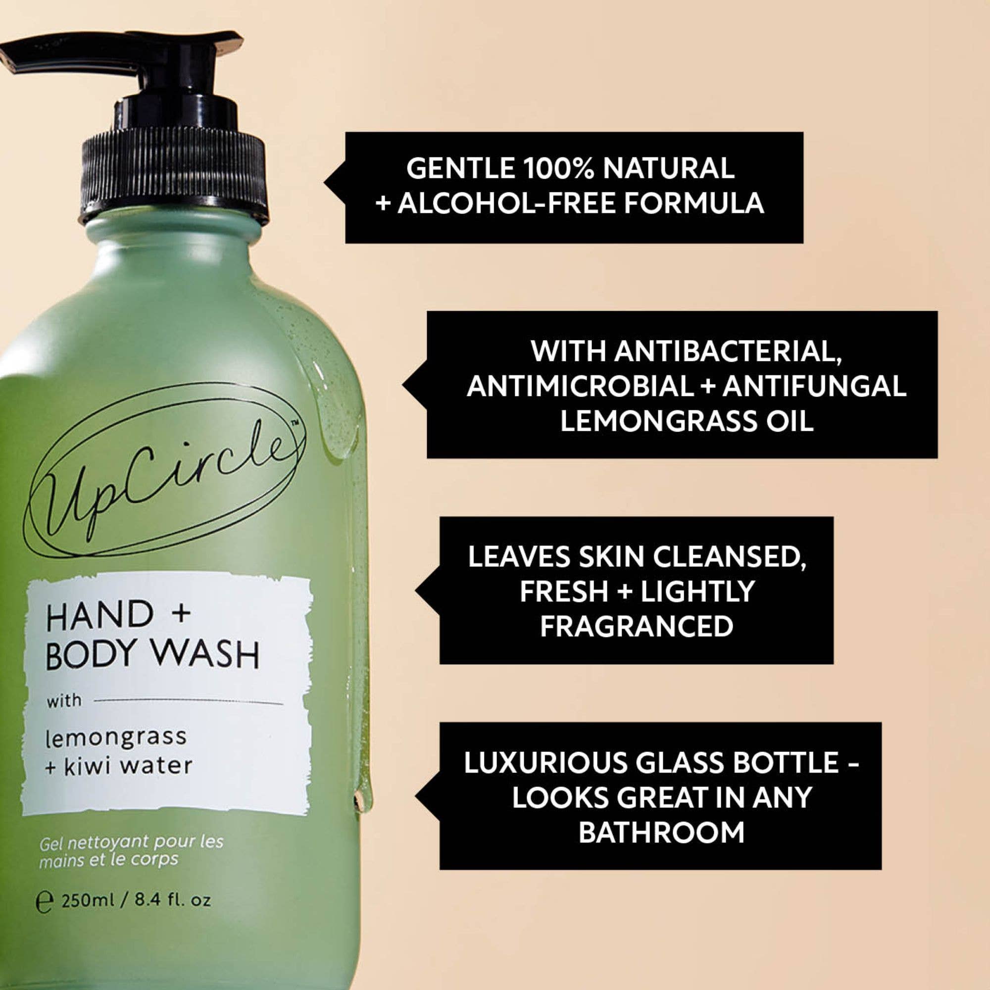 Green bottle of UpCircle hand and body wash with text about ingredients and benefits, on a beige background