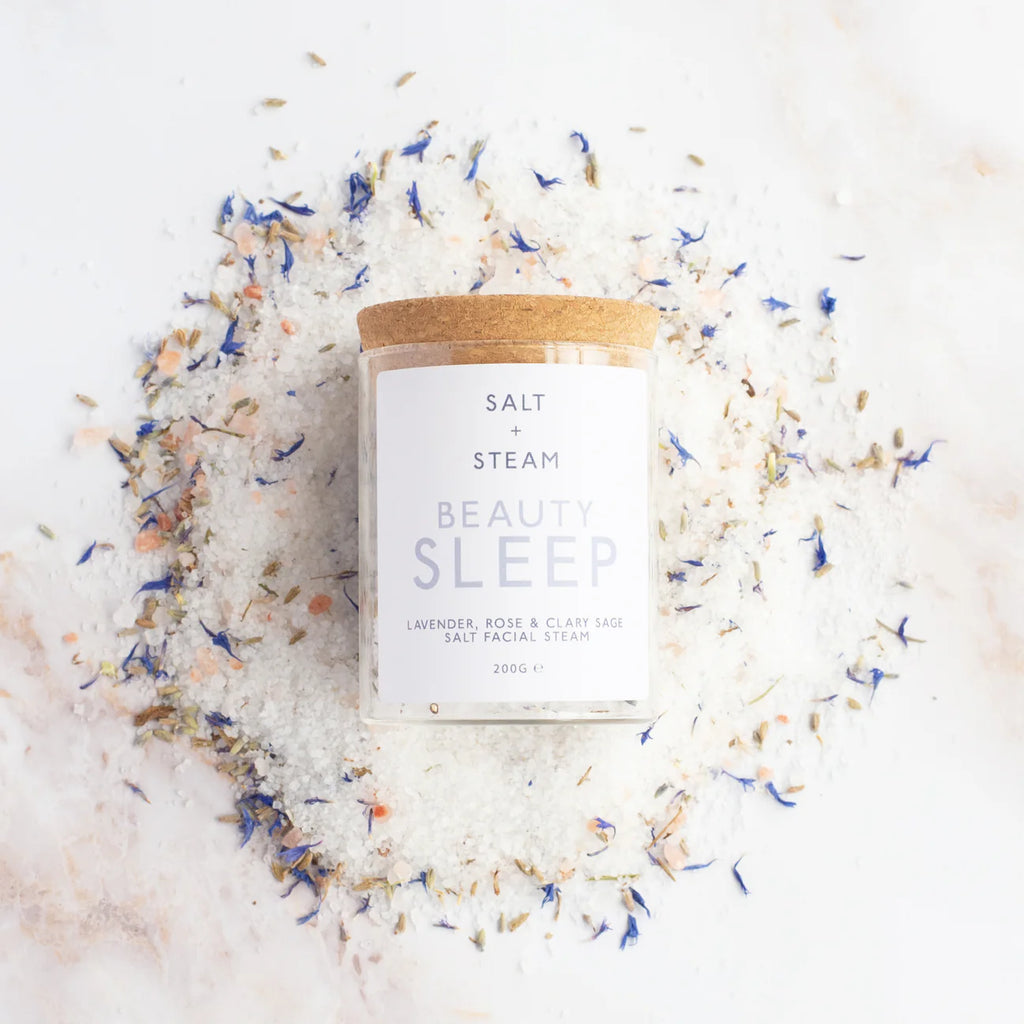 Salt and Steam Beauty Sleep salt facial steam product on a white background with decorative elements.