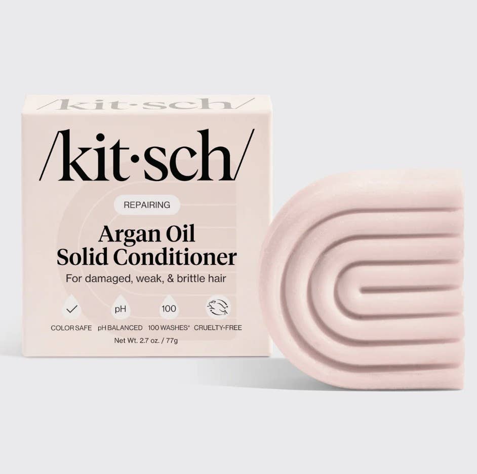 Kitsch Argan Oil Solid Conditioner packaging and bar on a light gray background