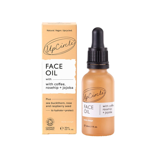 UpCircle face oil bottle and packaging on a white background