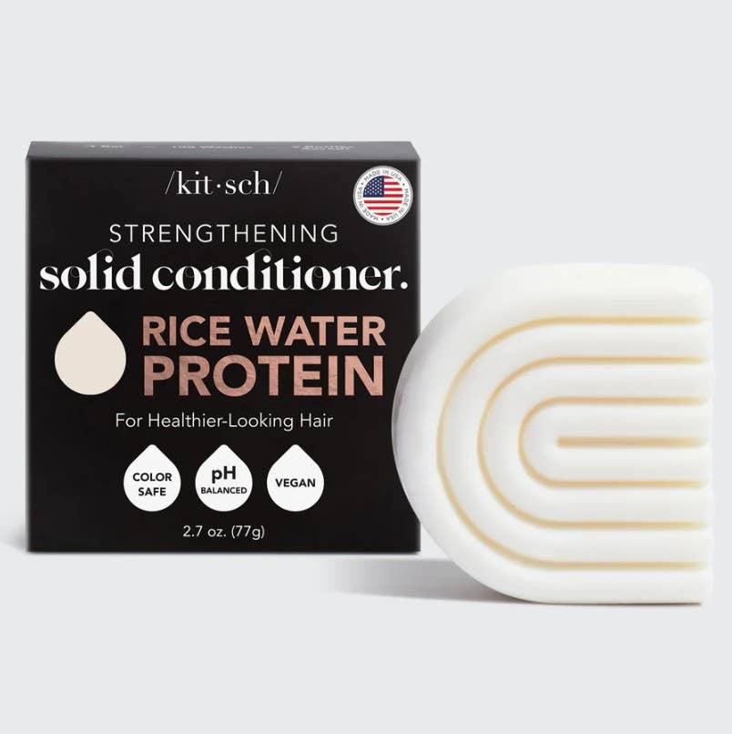 Kitsch strengthening solid conditioner bar with rice water protein on a white background