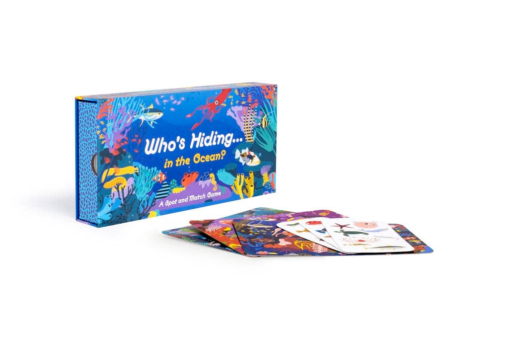 Colorful board game box and cards titled 'Who's Hiding in the Ocean' on a white background