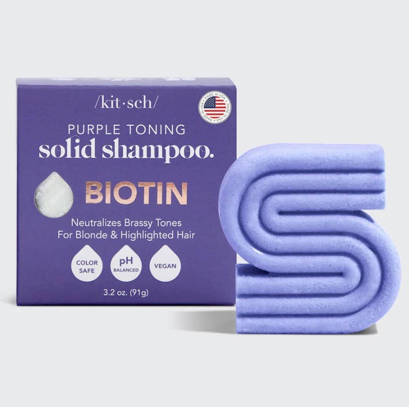 Kitsch Purple toning solid shampoo bar with packaging on a light gray background