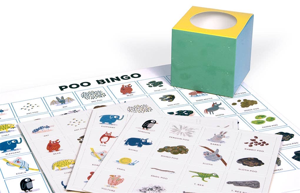 Poo Bingo game with cards and a cube on a white background